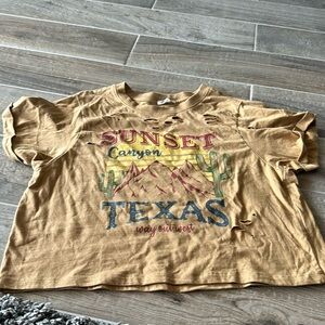 Super cute tshirt w rips only worn 1x